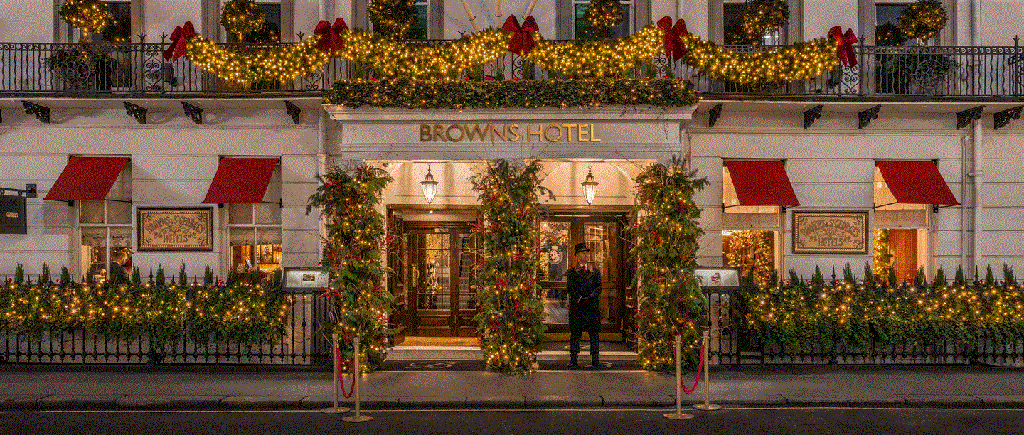 The entrance to Brown's Hotel decorated with Christmas lights and decorations.
