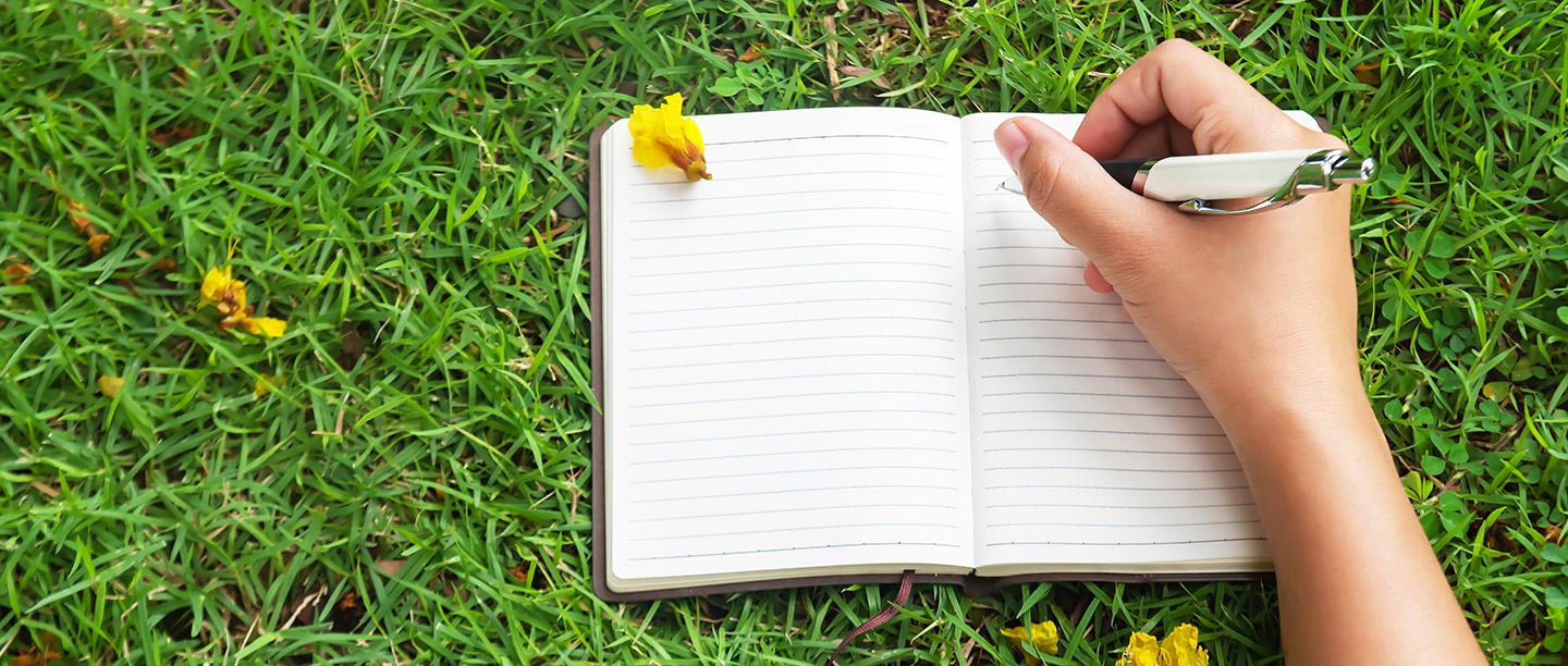 A young person writing a poem