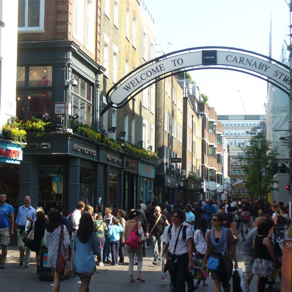 Photo of a busy Carnaby Street on a sunny day