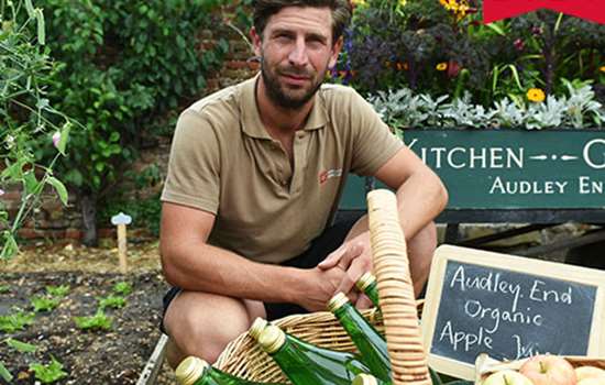 Image: gardener with produce at Audley End kitchen garden