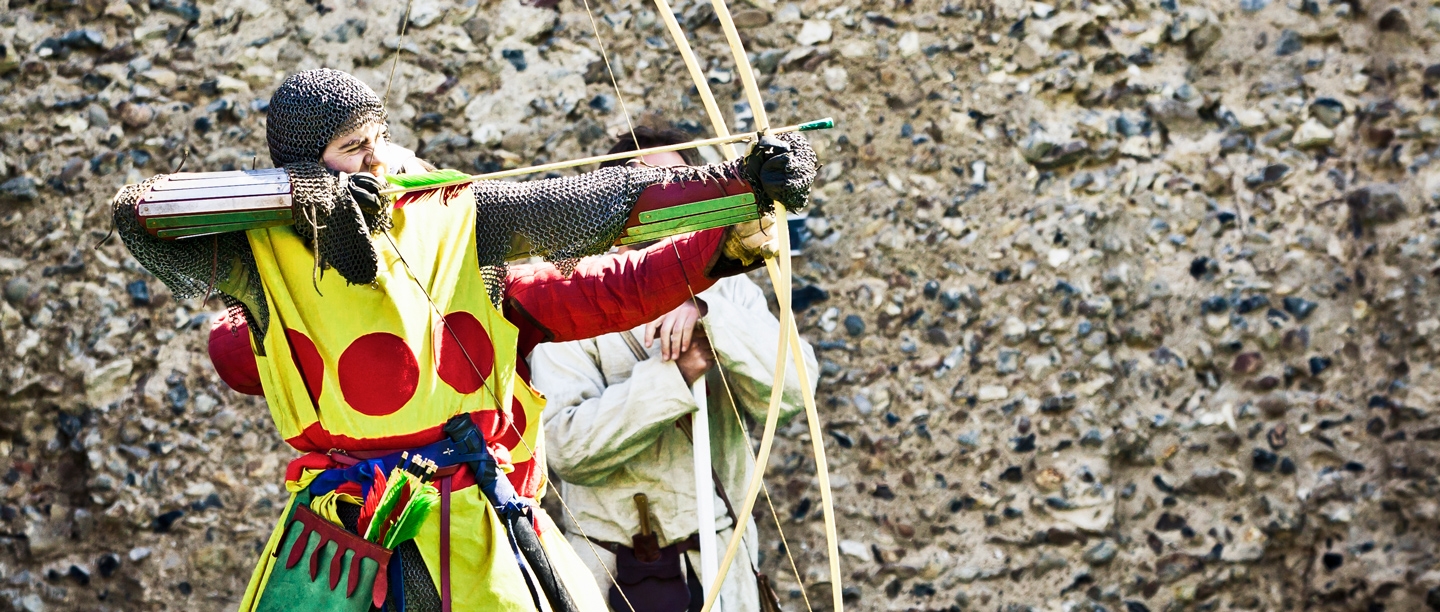 Image: re-enactor dressed as medieval archer