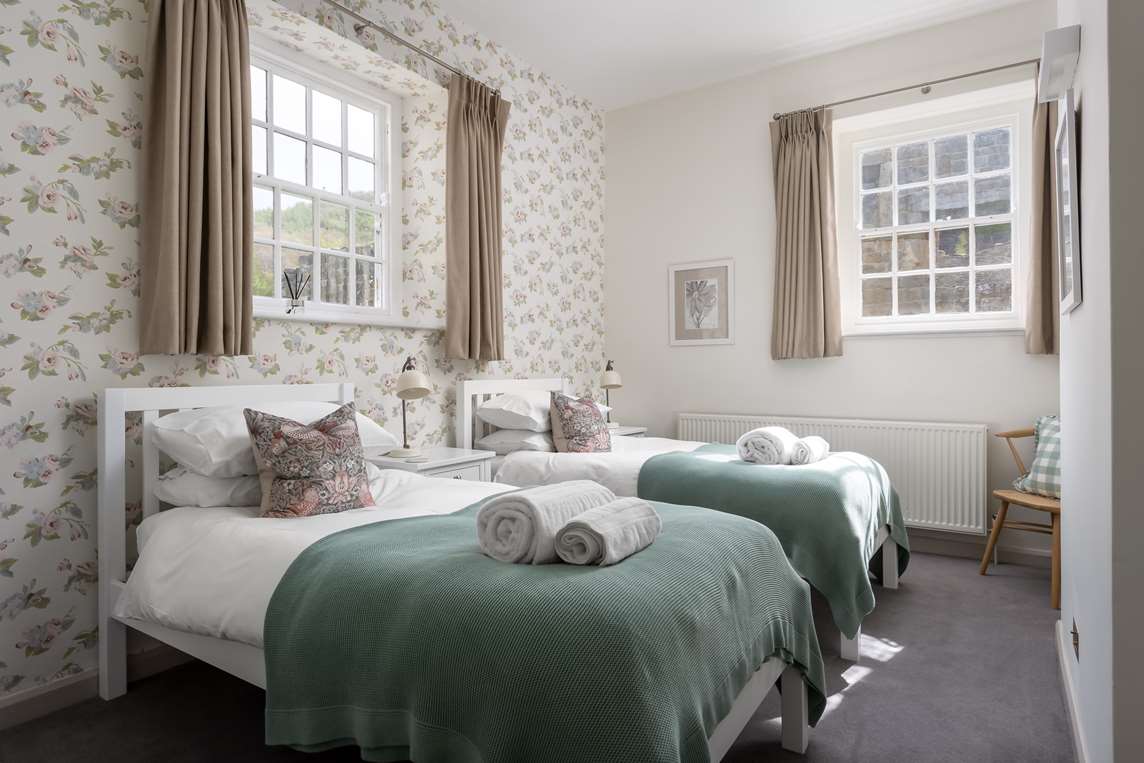 Twin bedroom, upper ground floor  Twin bedroom, upper ground floor