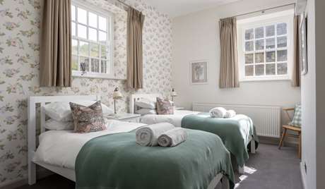 Twin bedroom, upper ground floor  Twin bedroom, upper ground floor