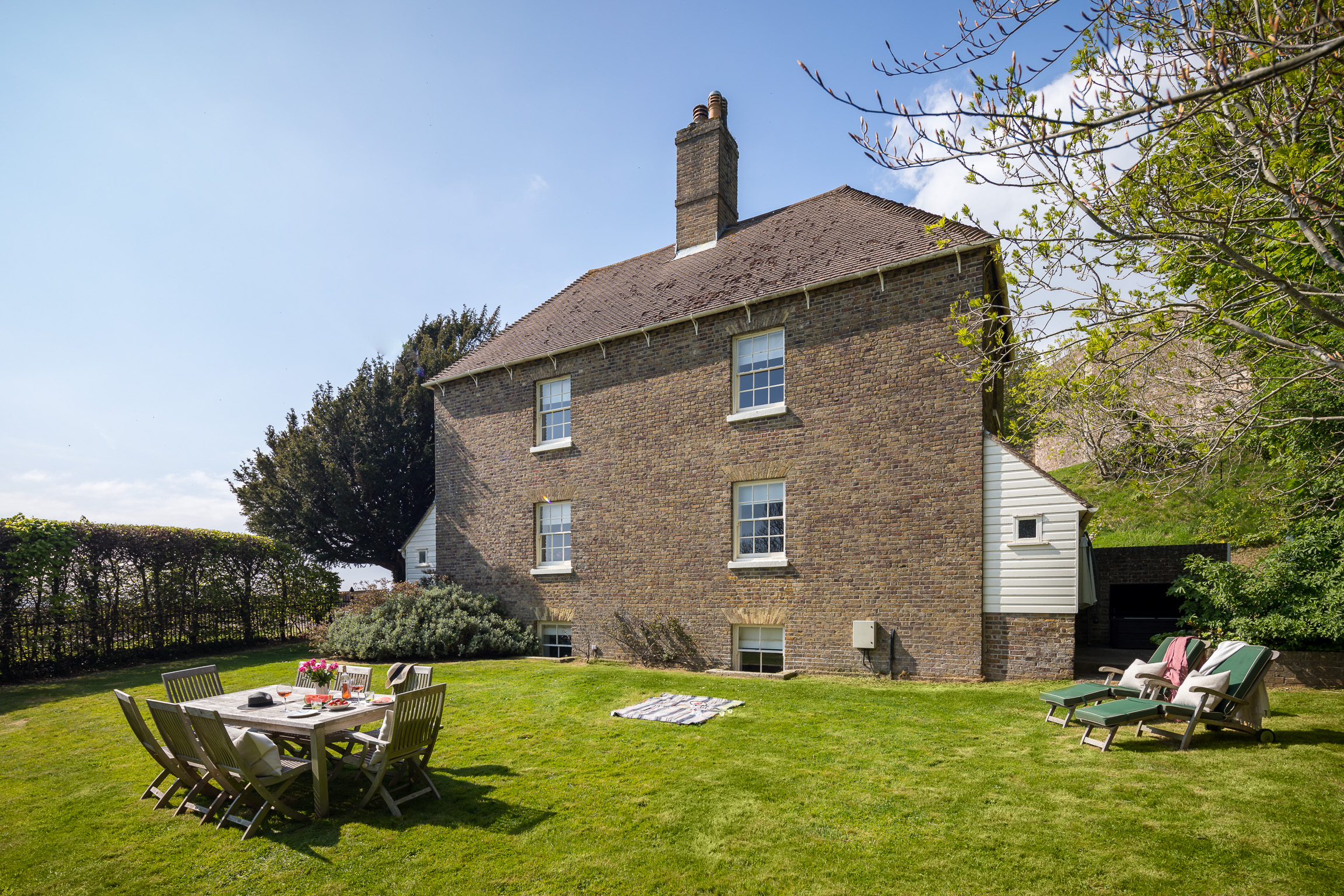 Private garden with outdoor seating and dining