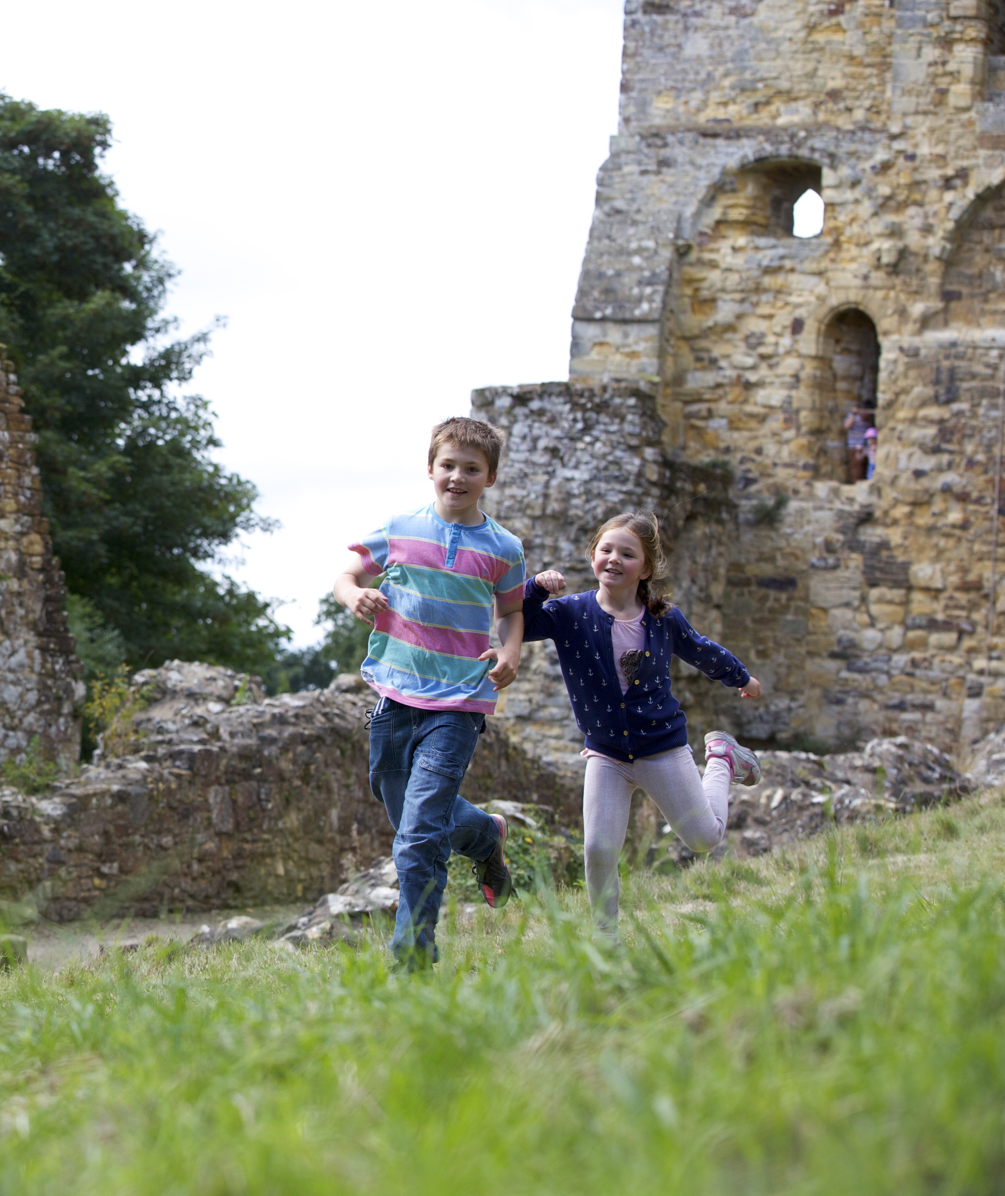 Image: Children running across the grass at Battle 