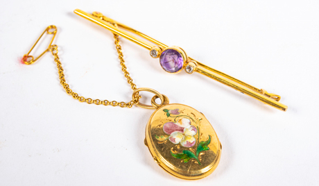  An oval gold, diamond and amethyst locket with floral decoration owned by Sylvia Grant-Dalton. The locket contains a photograph of her husband Charles. Sylvia and Charles were married for over 35 years and Sylvia continued to live in the hall for over 30 years after Charles’s death.