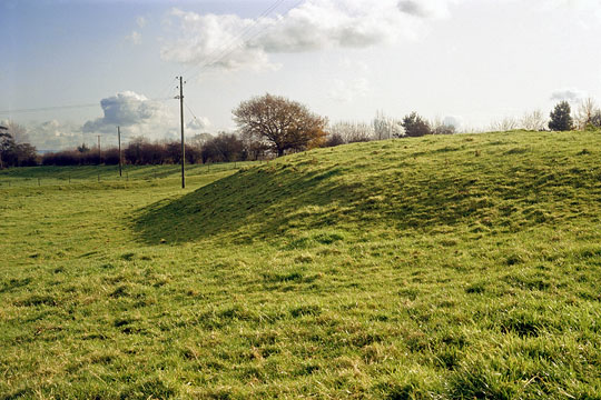 The bank and ditch structure of Hatfield Earthworks under turf