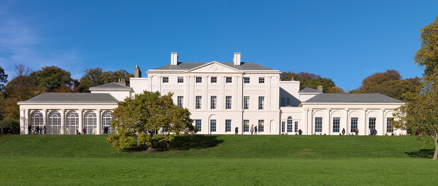 Kenwood House with people walking along the path in front of it.