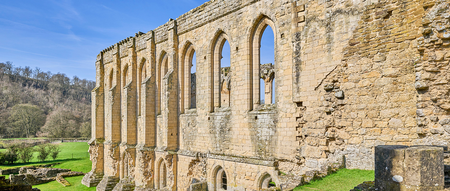 The south side of the refectory at Rievaulx Abbey on a sunny day.