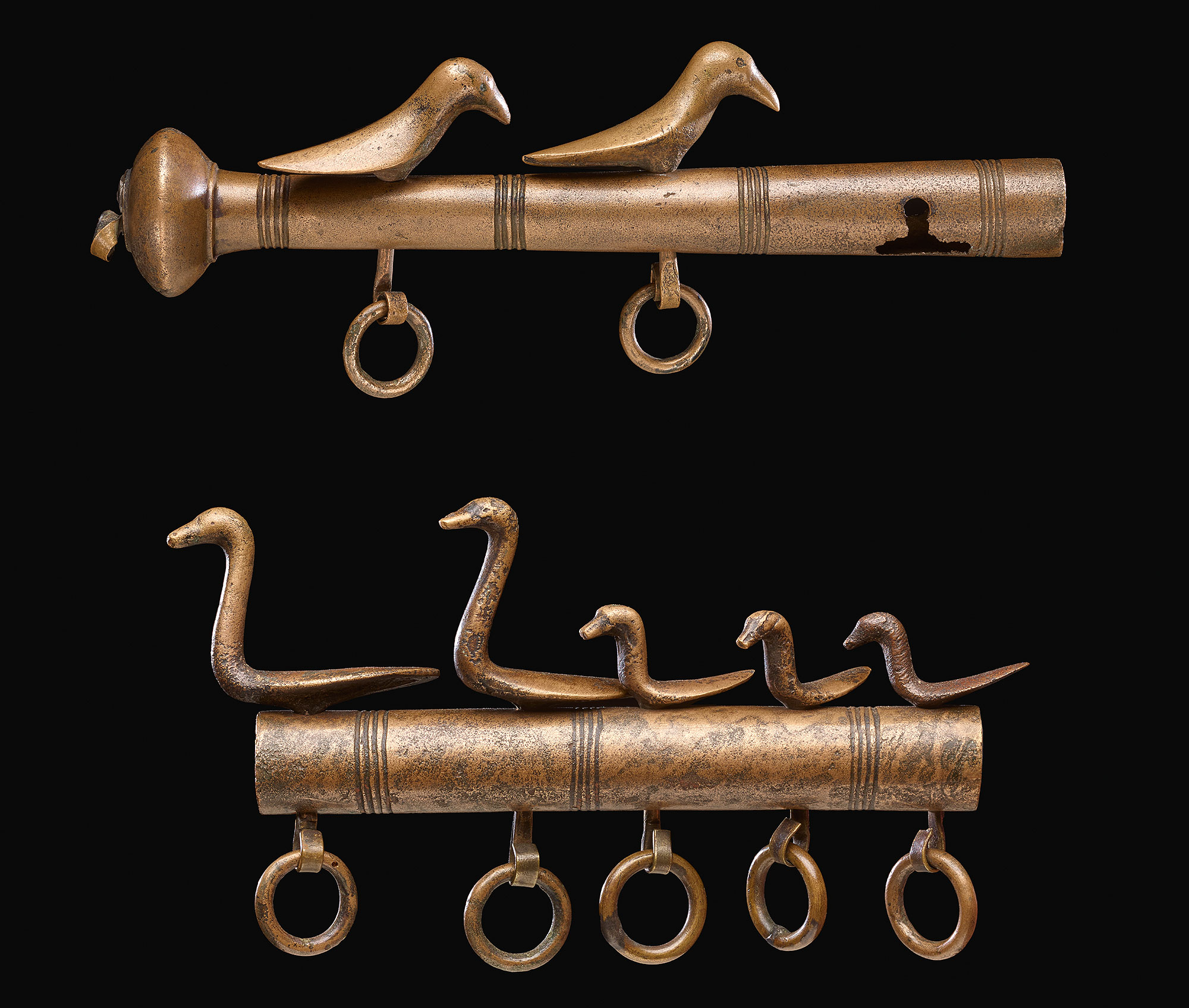 The birds on the Dunaverney flesh-hook, which dates from about 1100–800 BC.  They are some of the earliest objects known to have been made using a lost-wax process, when molten metal is poured into a wax mould