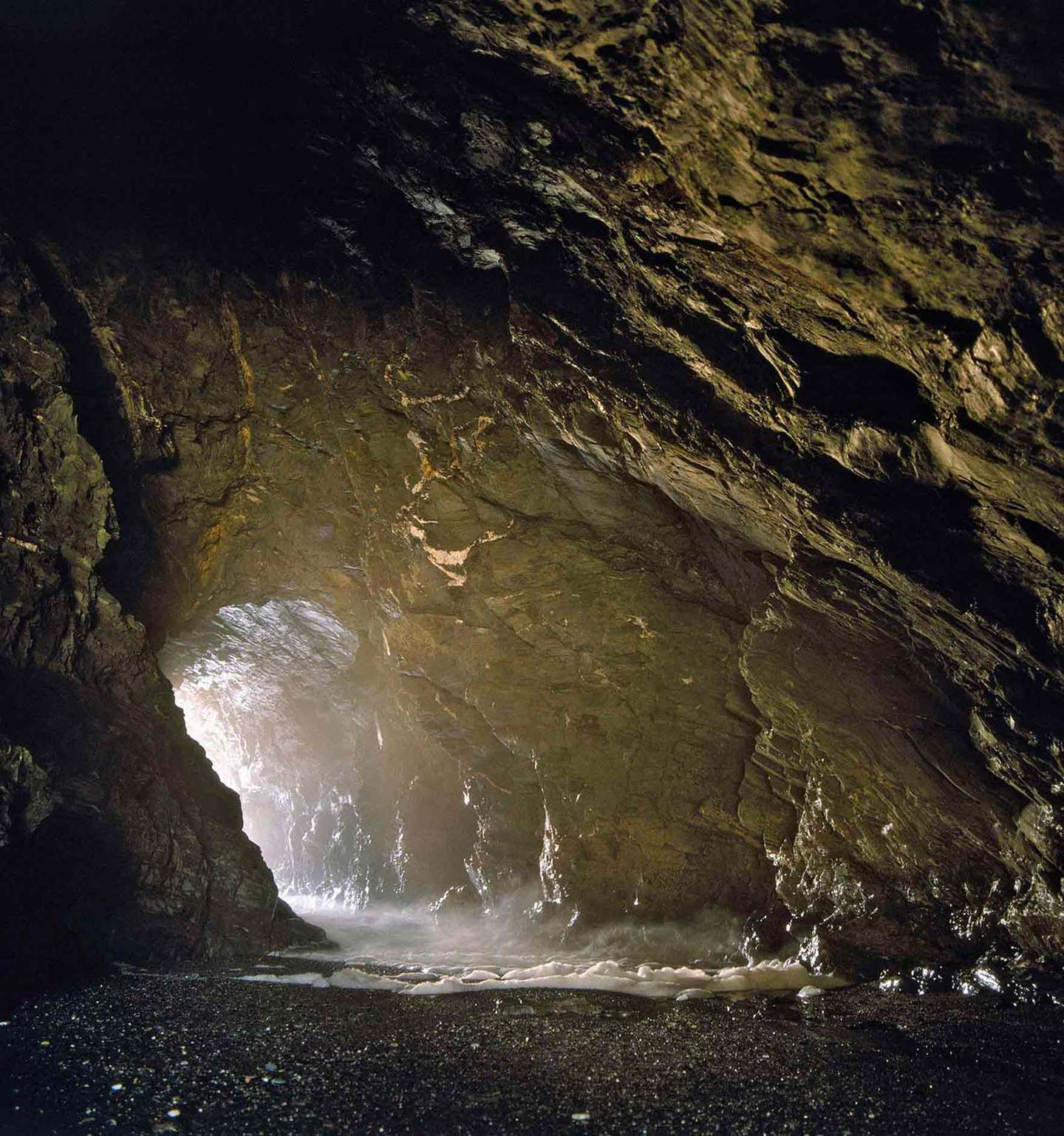 The cavern on the west side of the Haven beach, which has been known since the late 19th century as Merlin’s Cave
