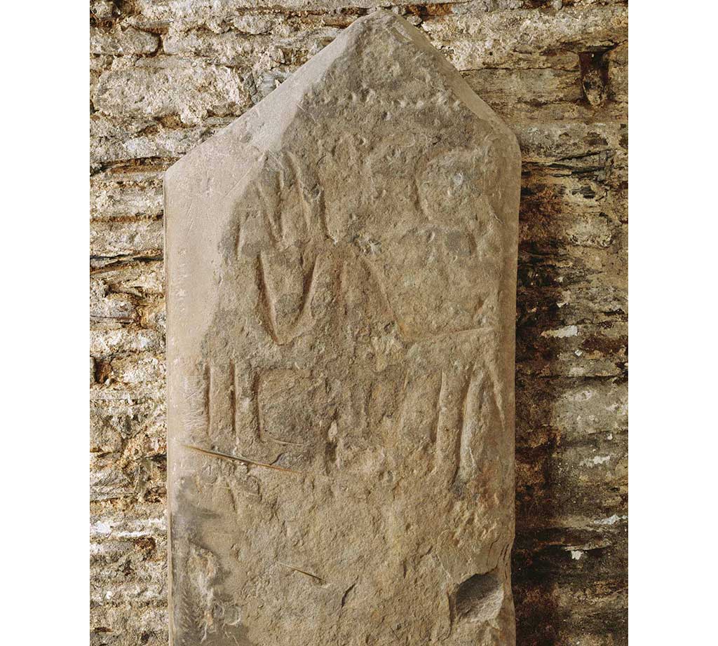 A Roman honorific marker found in Tintagel parish churchyard and now in the church