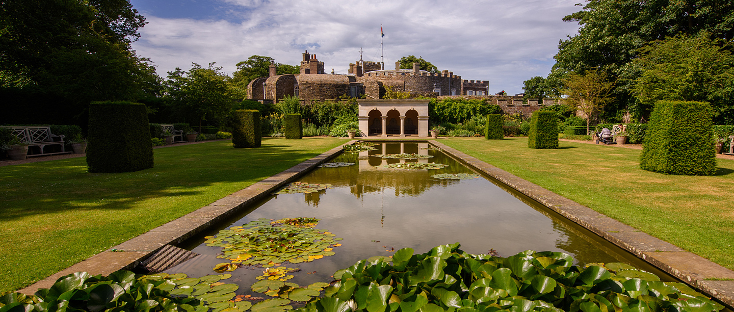 The long rectangular pond with lily pads in the Queen Mother's garden at Walmer Castle.