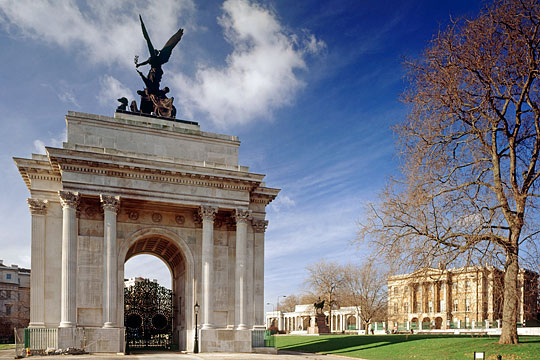 Hyde Park Corner from the east, showing the Wellington Arch, with the Hyde Park Screen, Boehm’s statue of Wellington and Apsley House in the background