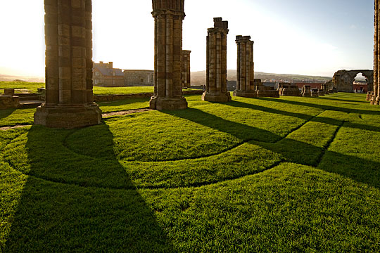 View from the choir across the plan of Whitby Abbey, a 12th-century church, marked out in the lawn