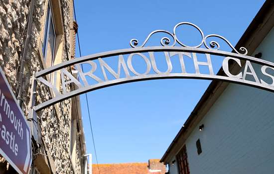 The sign over the entrance to Yarmouth Castle The sign over the entrance to Yarmouth Castle