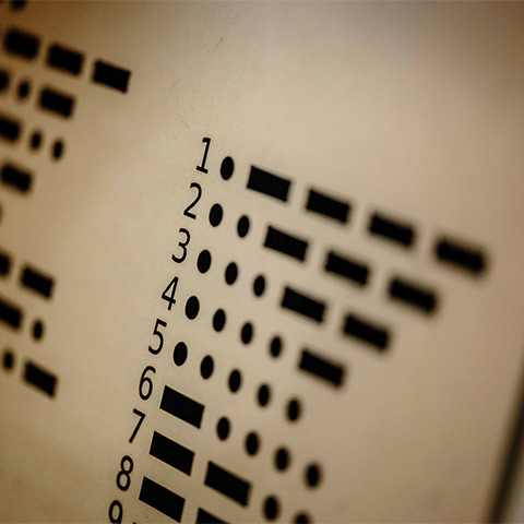 Close up of some numbers followed by dots and dashes