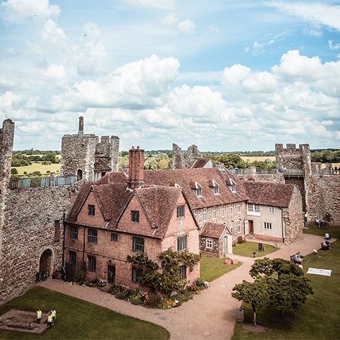 Some grand buildings stand within castle walls