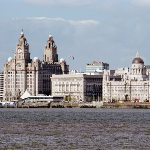 A view of Liverpool's city skyline from across the water.