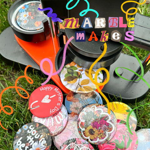 Colourful Mother's Day badges laid out on the grass. Magazine collage text reads 'Marble Makes'