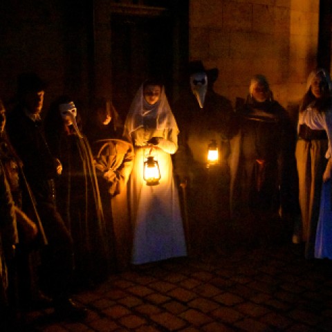 Spooky photo of people in ghostly costumes