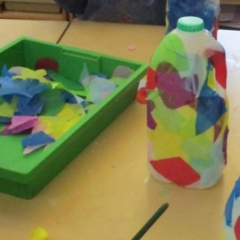 A colourful handmade milk lantern.