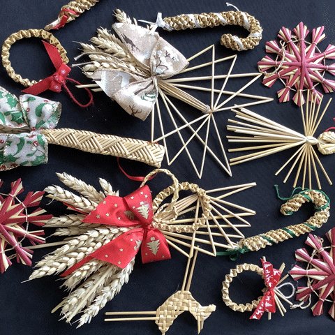 A selection of colourful handmade wheat Christmas decorations. A selection of colourful handmade wheat Christmas decorations.