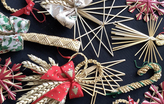 A selection of colourful handmade wheat Christmas decorations. A selection of colourful handmade wheat Christmas decorations.