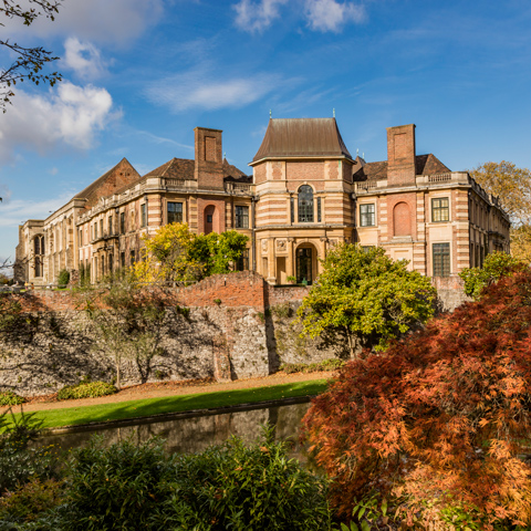 A view overlooking Eltham Palace on a sunny day in autumn.