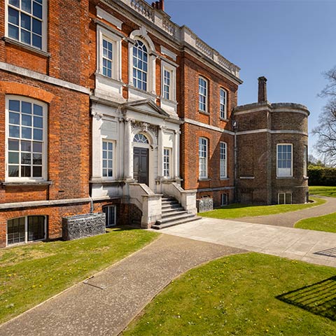 A grand red brick mansion