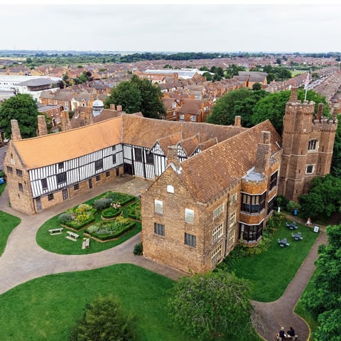 A view of Gainsborough Old Hall and courtyard garden from above.